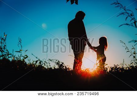 Father With Little Daughter Walk At Sunset Nature, Parenting