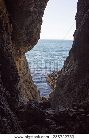 Stunning Views Of The Sea From The Natural Cave. Inside View.