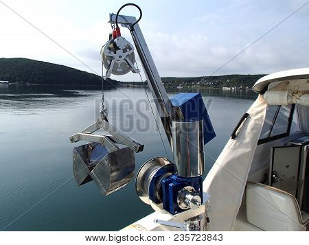 Research winch launching benthic grab to get sample from the sea bottom