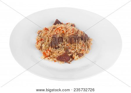 Pilaf, Rice With Meat, Beef, Lamb, With Onion And Carrots, Serving On Plate, Appetizing, Juicy On Wh
