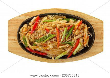 Funchoza, Chicken, Pork With Meat, Red Pepper And Green Onions, Serving In Hot Frying Pan, On Wooden