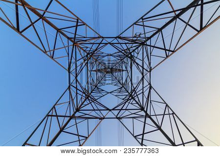 Uprisen Angle Of High Voltage Pole In Sunset Time Sky