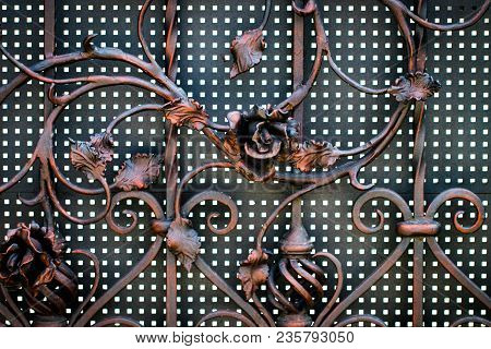 Details, Structure And Ornaments Of Forged Iron Gate. Floral Decorative Ornament, Made From Metal. V