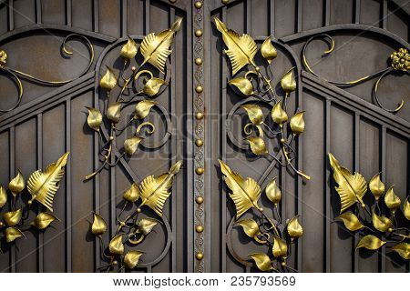 Details, Structure And Ornaments Of Forged Iron Gate. Floral Decorative Ornament, Made From Metal. V
