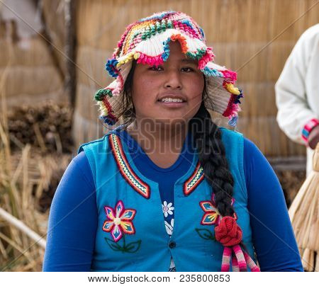 Puno, Peru - September 2017: Unidentified Women At The Floating Island Isla Flotante, Titicaca Lake,