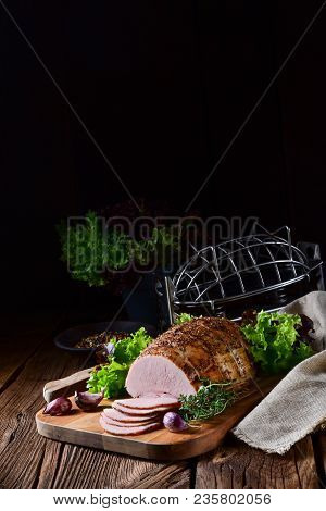 A Fresh And Tasty Cooked Ham With Colorful Pfefer