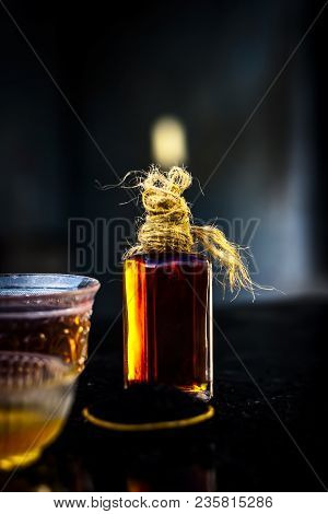 Close Up Of Ayurvedic Treatment Consisting Of Kalonji, Roman Coriander With Honey, Black Tea And Its