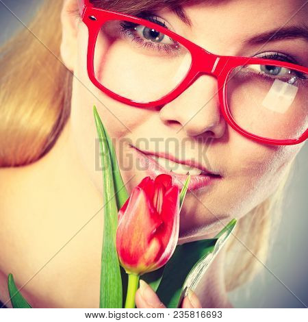 Delicacy And Subtlety Of Women. Young Adorable Woman With Spring Flower. Portrait Of Beauty Delicate