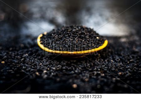 Close Up Of Kalonji, Roman Coriander, Mint Leaves, And Powder Of Kalonji With Its Extracted Oil For 