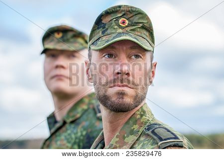 Two German Soldiers Looks To The Side