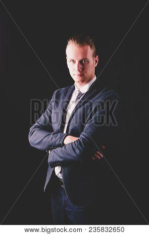 Concept Business People. Businessman On The Background. Businessmen Look Dastardly. Businessmen Show