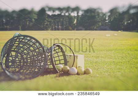 Golf At The Driving Range Four Or Is It Fore... Basket With Golf Balls At The Rough Zone Of Course