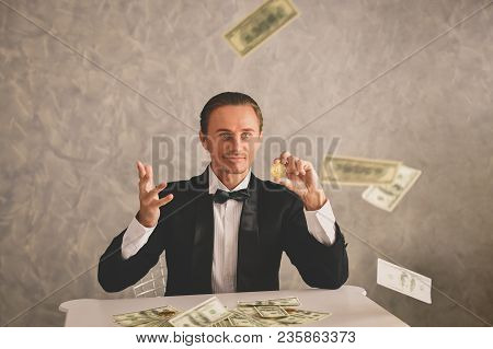 Concept Very Wealthy Businessman. Businessman Is Happy With His Money.a Businessman Showing His Mone