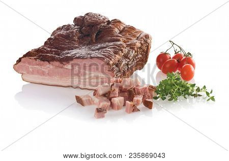 Smoked slab bacon with slices. Isolated on white background