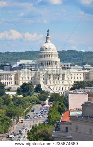 Washington D.C. - An aerial view of Pennsylvania Avenue with federal buildings including US Archives building, Department of Justice, FBI Headquarters and US Capitol Hill
