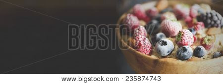 Oatmeal Porridge With Frozen Berries, Almonds In Wooden Bowl. Banner. Healthy Breakfast. Clean Eatin