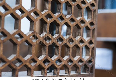 The Texture Of A Modern Wall With Multi-faceted Holes. Selective Focus.
