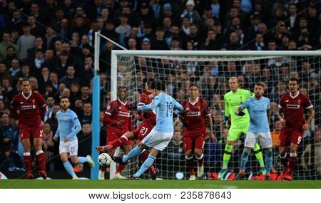 MANCHESTER, ENGLAND - APRIL 10:  Leroy Sane  takes a shot at goal during the Champions League quarter final match between Manchester City and Liverpool at the Etihad Stadium on April 10, 2018 