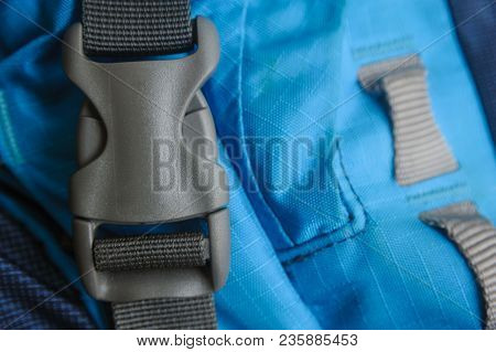Closed Grey Fastex Buckle Of Trekking Backpack
