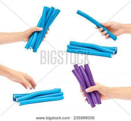 Set Of Different Colored Hair Curlers, Isolated On White Background.
