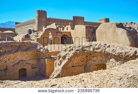 Ruins Of The Ancient Buildings In Archaeological Site And The Massive Walls And Watchtowers Of Rayen