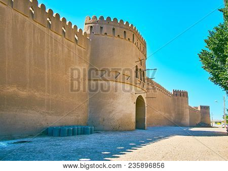 The View With A Facade Wall, Gate And Towers Of Ancient Clay Citadel Of Rayen, Iran.