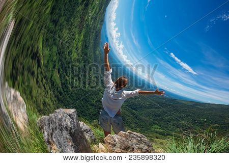 Digital Artifact Of Rolling Shutter In Photo Camera. Distortion Of Skyline. Caucasian Woman Standing