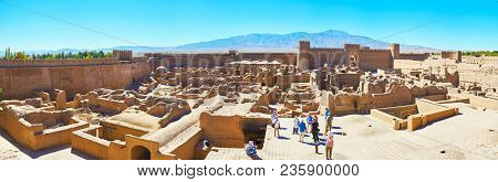 Rayen, Iran - October 16, 2017: Tourists Visit Museum Of Ancient Arg-e Rayen - The Adobe Fortress Wi