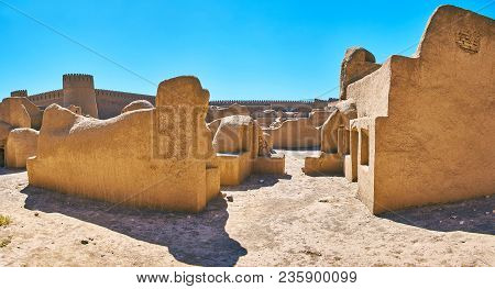 Walk Along The Street With Ruined Adobe Buildings Of Rayen Fortress, Iran.