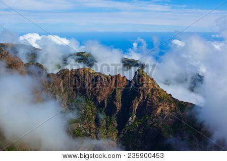 Hiking Pico do Arierio and Pico Ruivo - Madeira Portugal - travel background