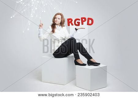 RGPD, Spanish, French and Italian version version of GDPR: Reglamento General de Proteccion de datos. General Data Protection Regulation. Young woman working with information.