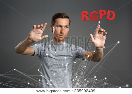 RGPD, Spanish, French and Italian version version of GDPR: Reglamento General de Proteccion de datos. General Data Protection Regulation. Young man working with information.