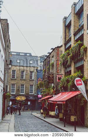 Dublin, Ireland - April 12th, 2018: The Temple Bar Pub In Dublin, Arguably The Most Popular Traditio