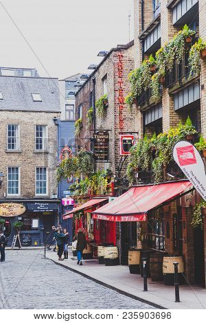 Dublin, Ireland - April 12th, 2018: The Temple Bar Pub In Dublin, Arguably The Most Popular Traditio