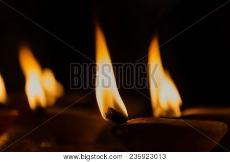 Sacred Fire - Oil Candles Inside Hindu Temple.
