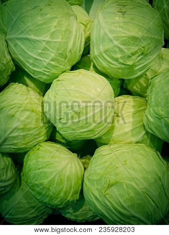 Green Cabbage In A Vegetable Market.the Cabbage Group