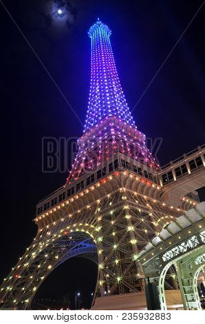 Macau, China- 07 Apr, 2018: The Replica Eiffel Tower At The Parisan Hotel On The Island Of Macau Lit