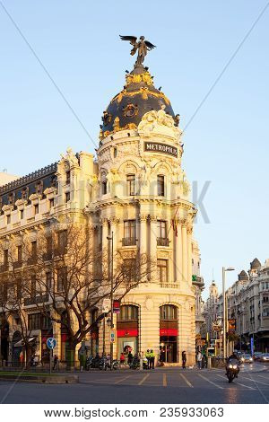 Madrid, Spain - April 5, 2010: Gran Via And The Iconic Metropolis Building Sourrounded By Trational 