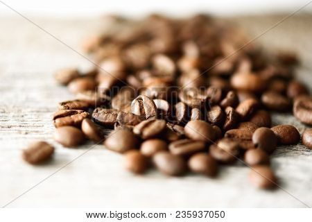 Coffee Beans On Light Wooden Background With Copyspace For Text. Coffee Background, Food Frame, Text