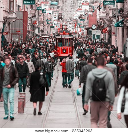 Istanbul, Turkey - April 07, 2013: Crowd Of People Walking At The Independence Avenue Or Istiklal Ca
