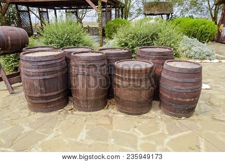 Stacked Wine Barrels. Decoration Of The Barrels In The Village Ataman