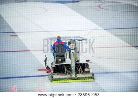 Resurfacing Machine Cleaning Ice Of Hockey Rink