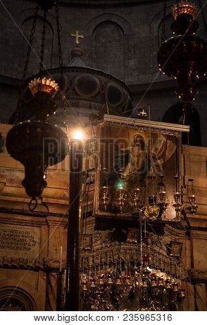 Jerusalem, Israel - March 17th, 2018: Pilgrims Pray In The Church Of The Holy Sepulcre, In The Old C