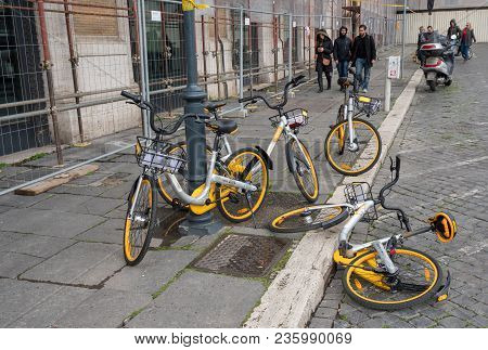 Rome, Italy - March 18, 2018: Obike Bike Sharing Bicycles On Sidewalk In Rome, Italy