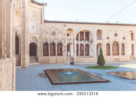 Kashan, Iran, Novemver 10.2016: The Courtyard Of The Tabatabaei House With Ornamental Wall Decoratio