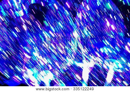 Defocused Blurred Image Of Neon Lights Of Illuminated Balloons Filled With Hellium With Led Diods At
