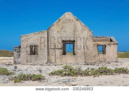 Old Historic Home Building As Ruin At Coast Of Island Bonaire