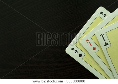 Cards From The Playing Deck, Three Of Sevens And Ace, As A Symbol Of Gaming Addiction And Casino. Cl