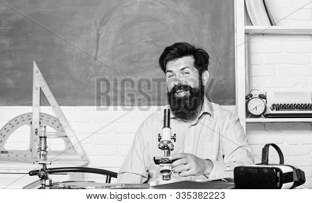 Science Chemistry Concept. Bearded Man Teacher. Back To School. Modern Laboratory. Biologist Conduct