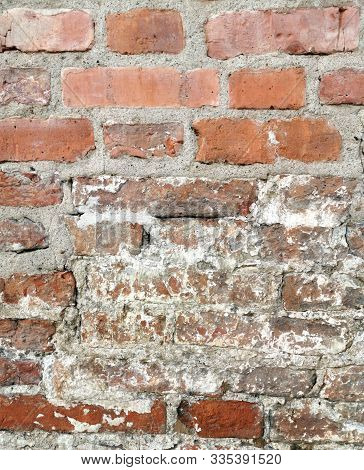 Old Brick Wall In A Background Image. Close Up